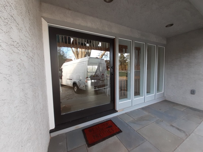 Wide-glass-entry-door-with-black-frame